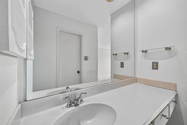 a view of a bathroom with a glass door