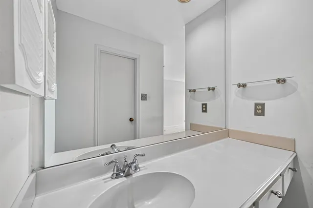 a view of a bathroom with a glass door