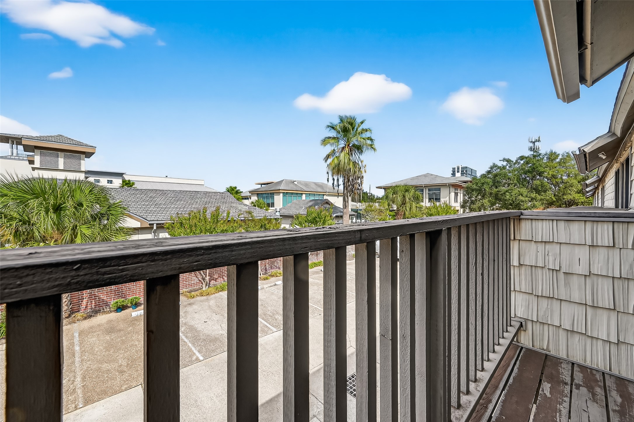 2829 Timmons Lane, Unit 176 Houston, TX 77027 - Photo 31 of 34 a view of a balcony with a potted plant