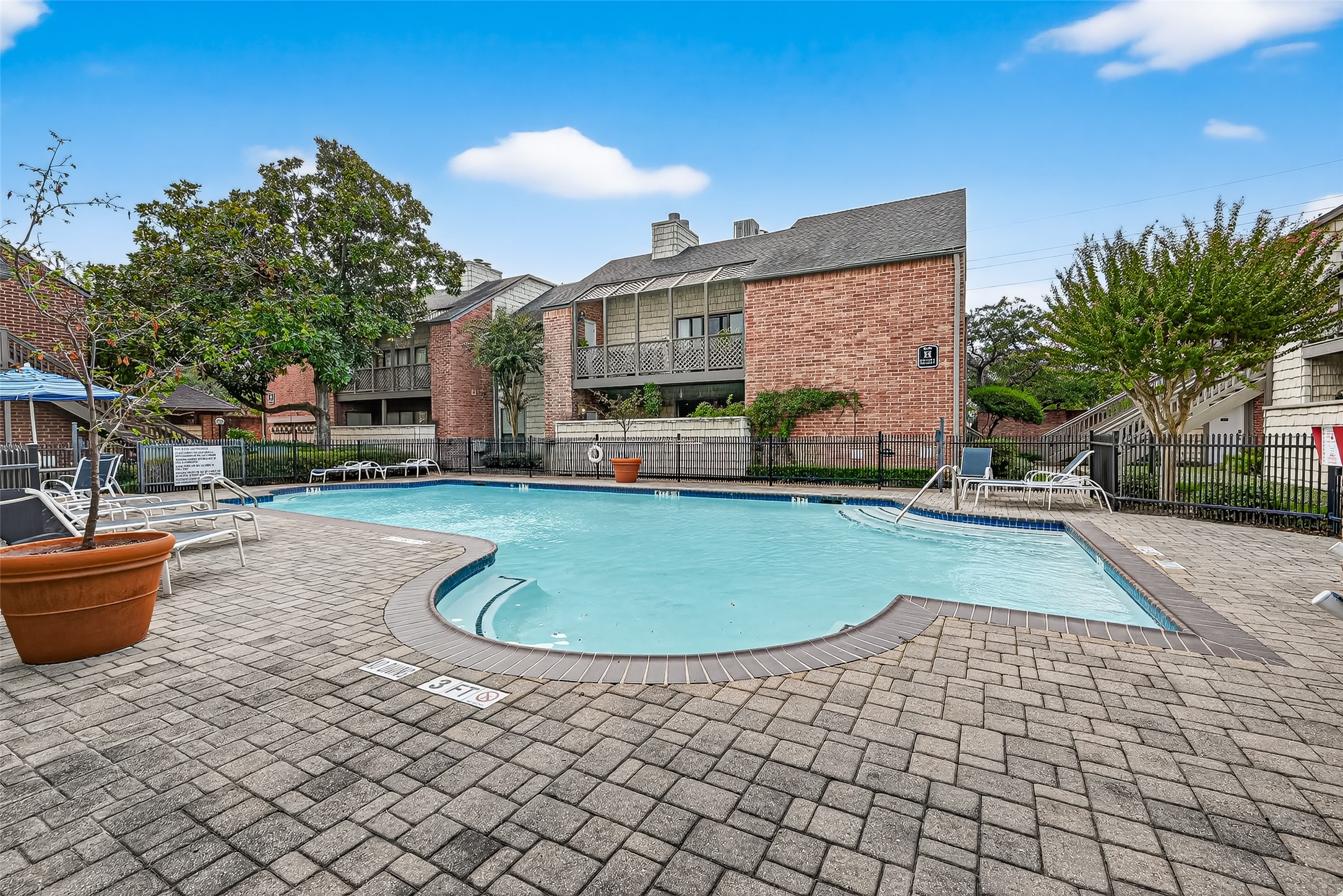 2829 Timmons Lane, Unit 176 Houston, TX 77027 - Photo 32 of 34 a view of outdoor space yard and patio