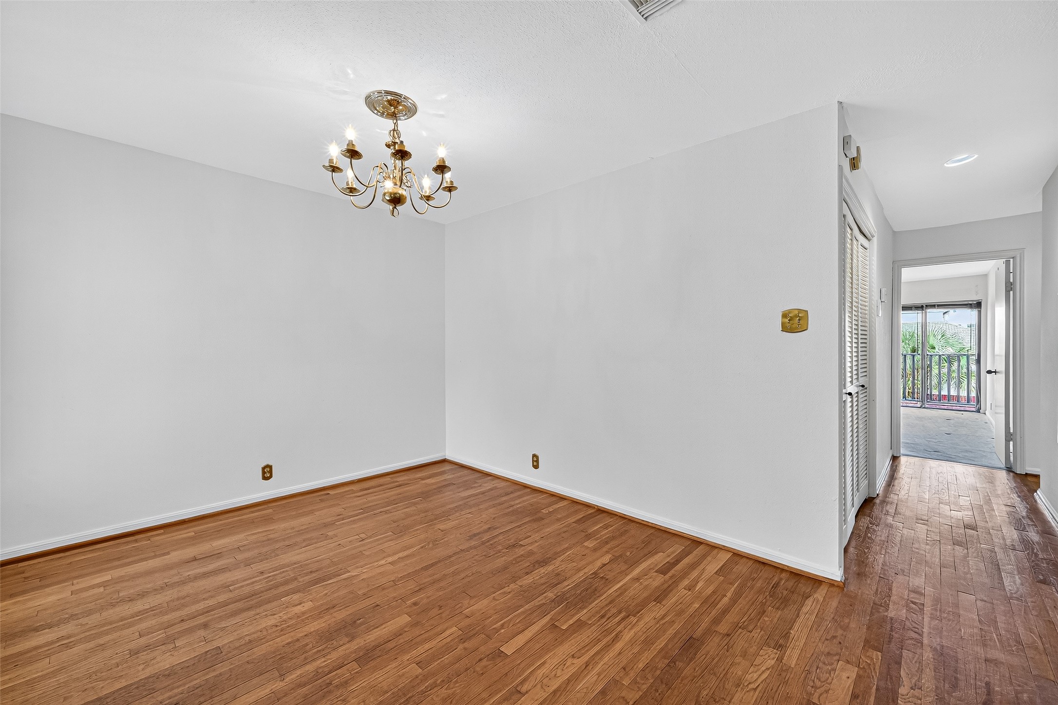 2829 Timmons Lane, Unit 176 Houston, TX 77027 - Photo 8 of 34 a view of room with wooden floor