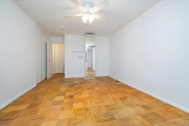 a view of a room with a sink and cabinet