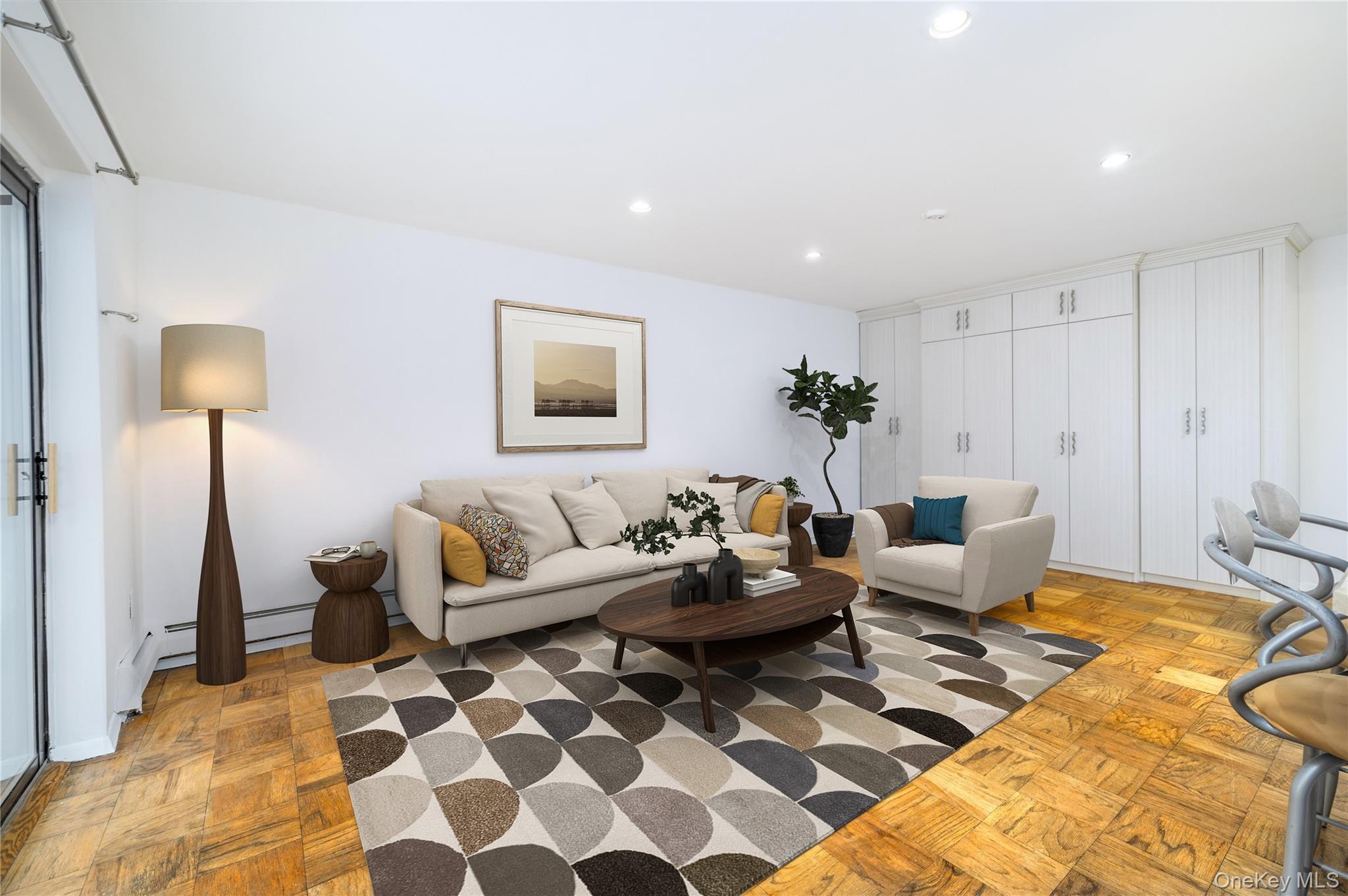 420 Shore Road, Unit 1F Long Beach, NY 11561 - Photo 9 of 32 a living room with furniture and a rug