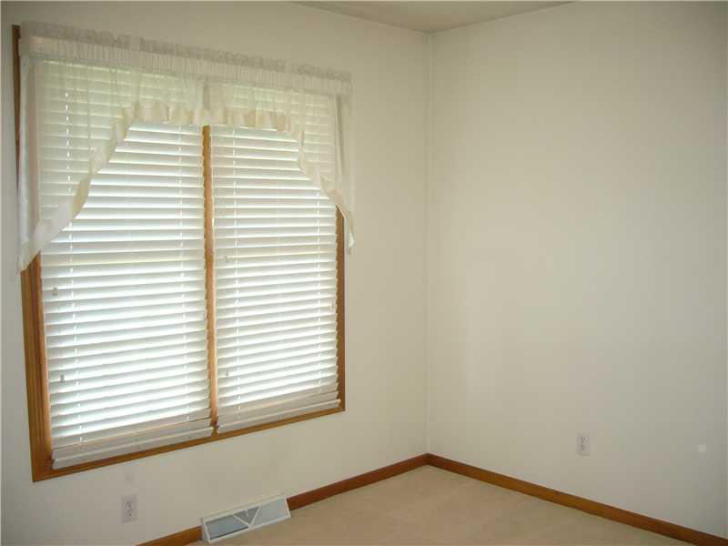 101 Rochelle Lane Monaca, PA 15061 - Photo 11 of 15 Bedroom. Third bedroom with large window, large closet and window treatments.
