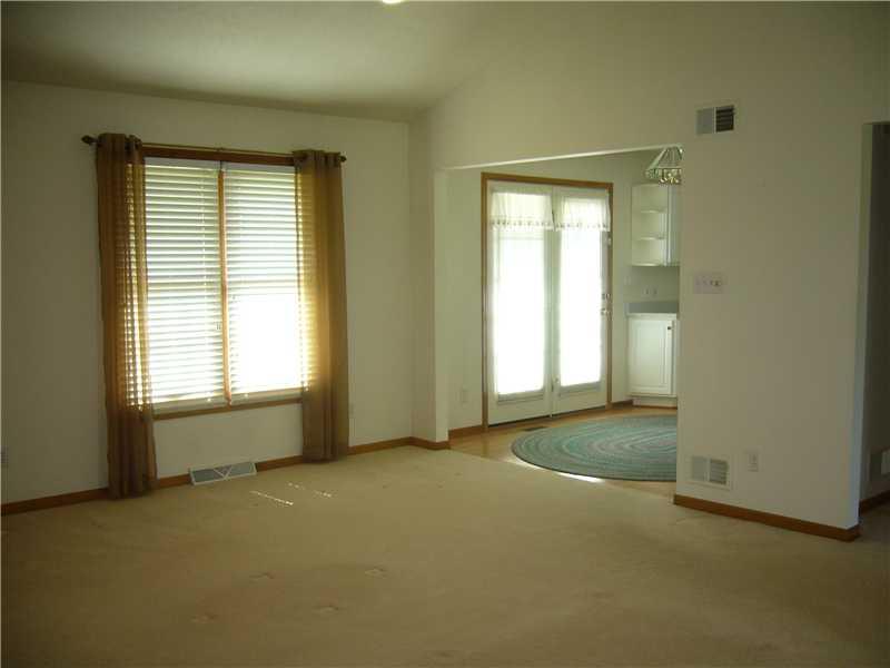 101 Rochelle Lane Monaca, PA 15061 - Photo 4 of 15 Living Room. Another view of the living room with access to the eat-in kitchen and dining room.
