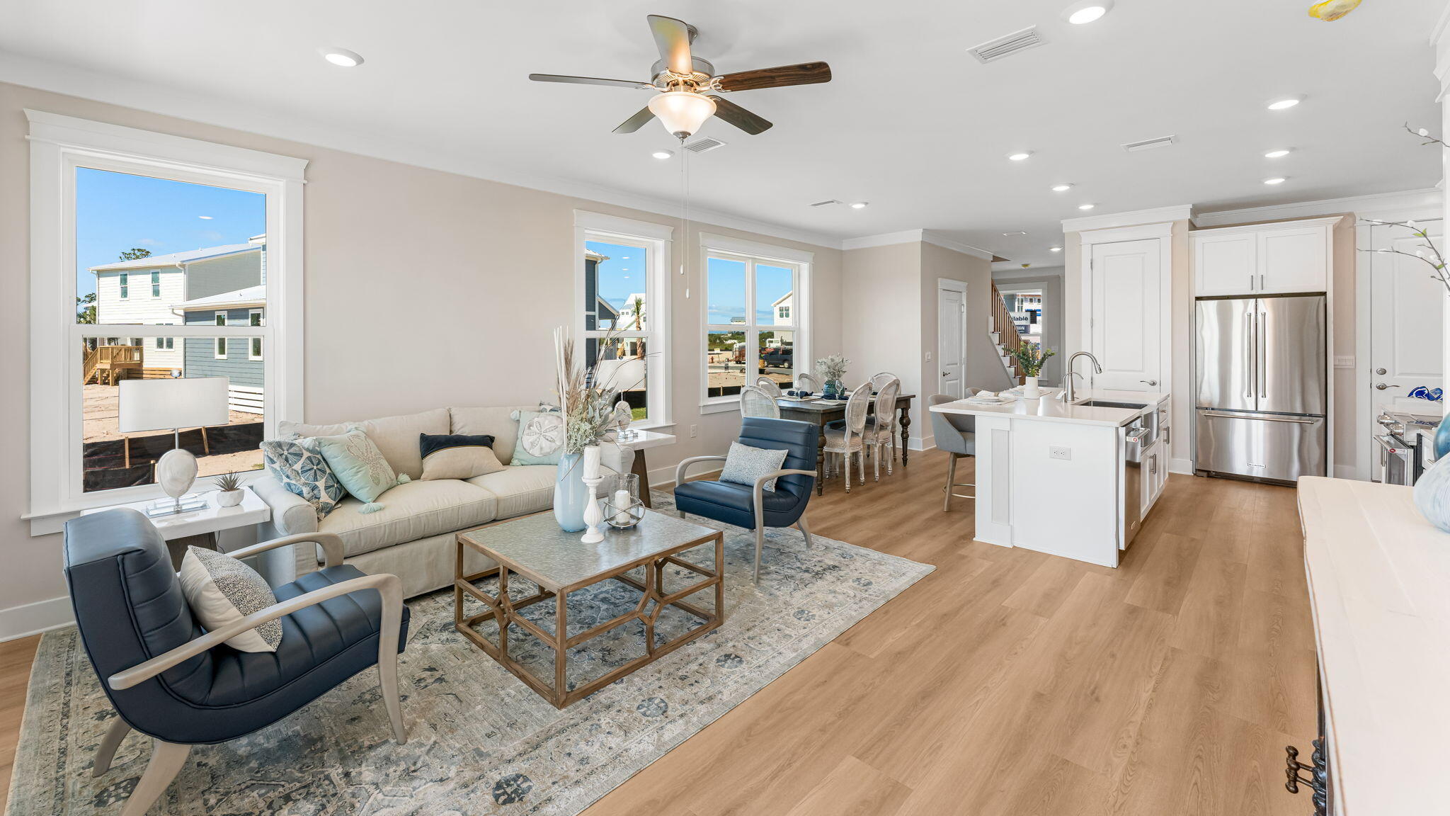 175 Marsh View Ridge Ln Cape Port St. Joe, FL 32456 - Photo 13 of 41 a living room with furniture or kitchen view and a wooden floor