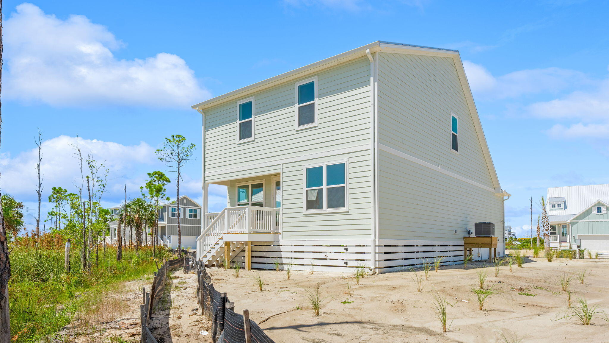 175 Marsh View Ridge Ln Cape Port St. Joe, FL 32456 - Photo 6 of 41 a view of a house with a patio