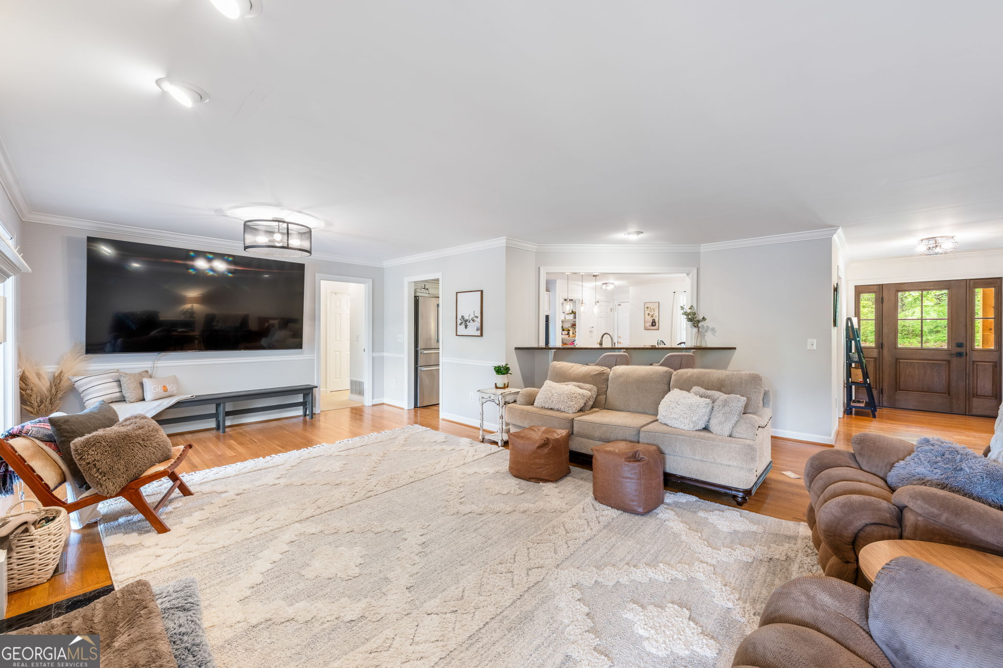 570 Martin Mill Road Moreland, GA 30259 - Photo 11 of 68 a living room with furniture and a flat screen tv