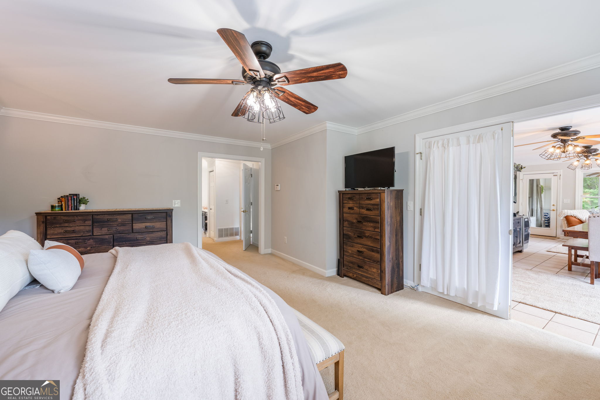 570 Martin Mill Road Moreland, GA 30259 - Photo 24 of 68 a bed room with a bed and a television