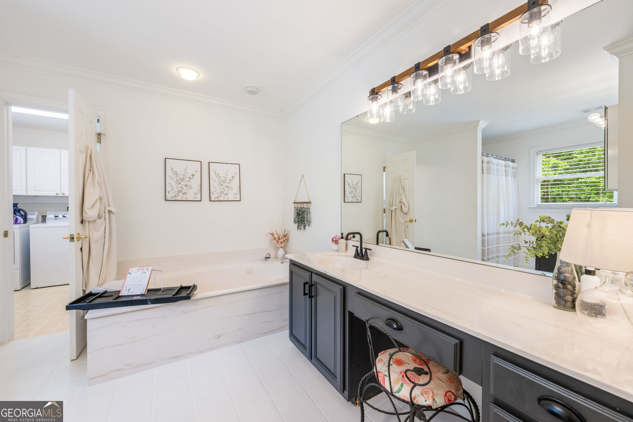 570 Martin Mill Road Moreland, GA 30259 - Photo 26 of 68 a bathroom with a double vanity sink mirror and bathtub