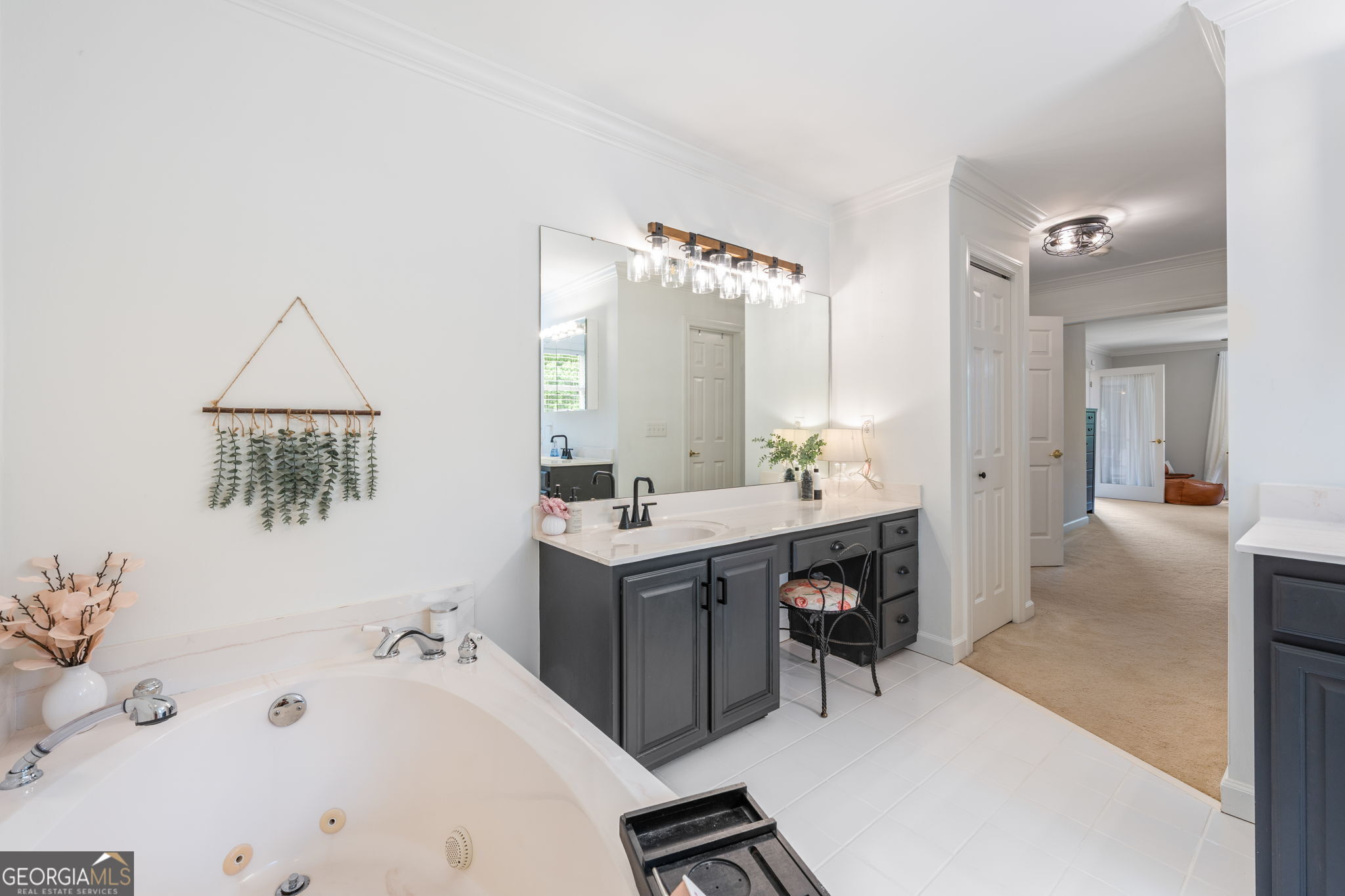 570 Martin Mill Road Moreland, GA 30259 - Photo 27 of 68 a bathroom with a sink and a mirror