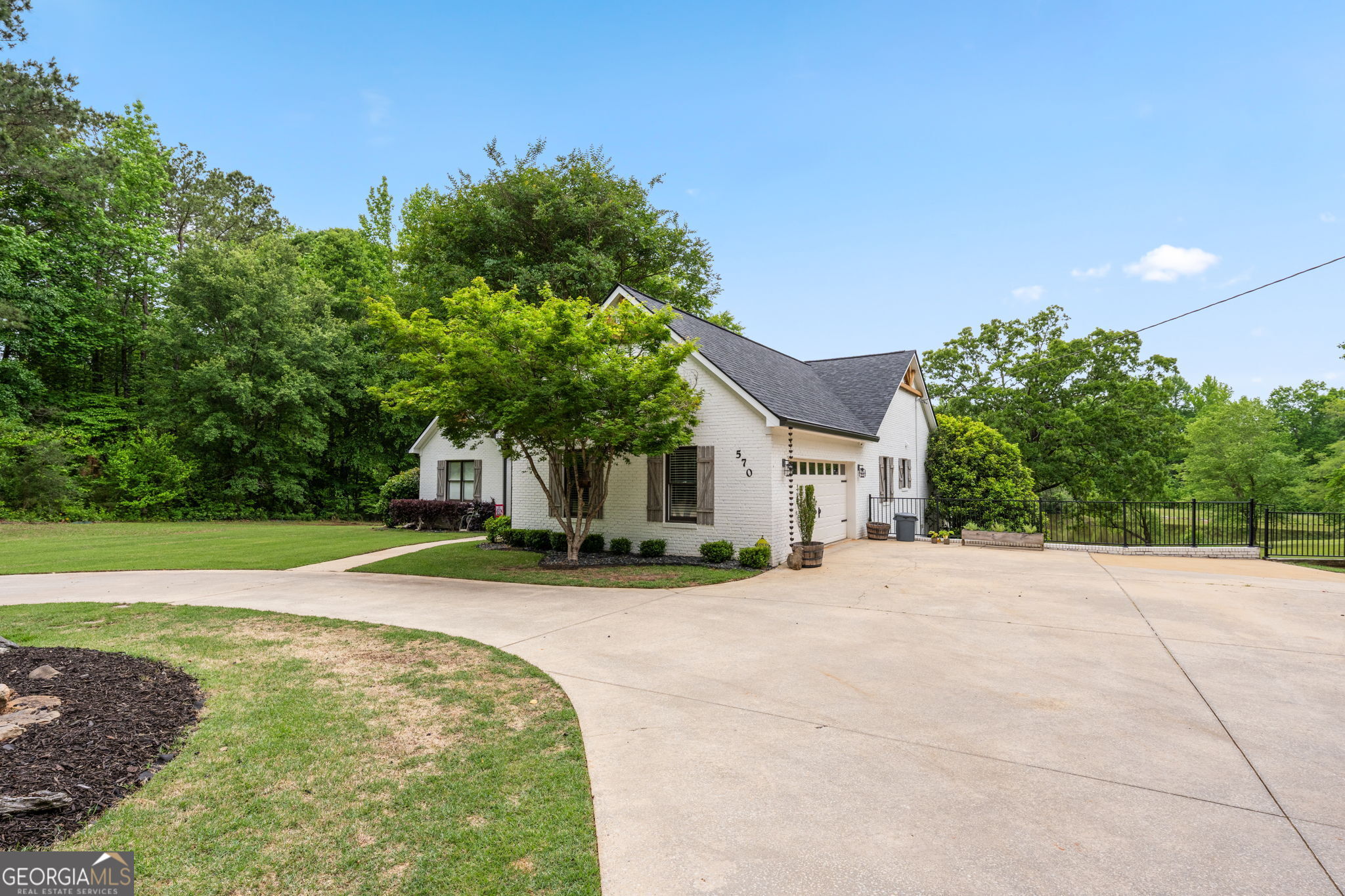 570 Martin Mill Road Moreland, GA 30259 - Photo 3 of 68 a house with yard in front of it
