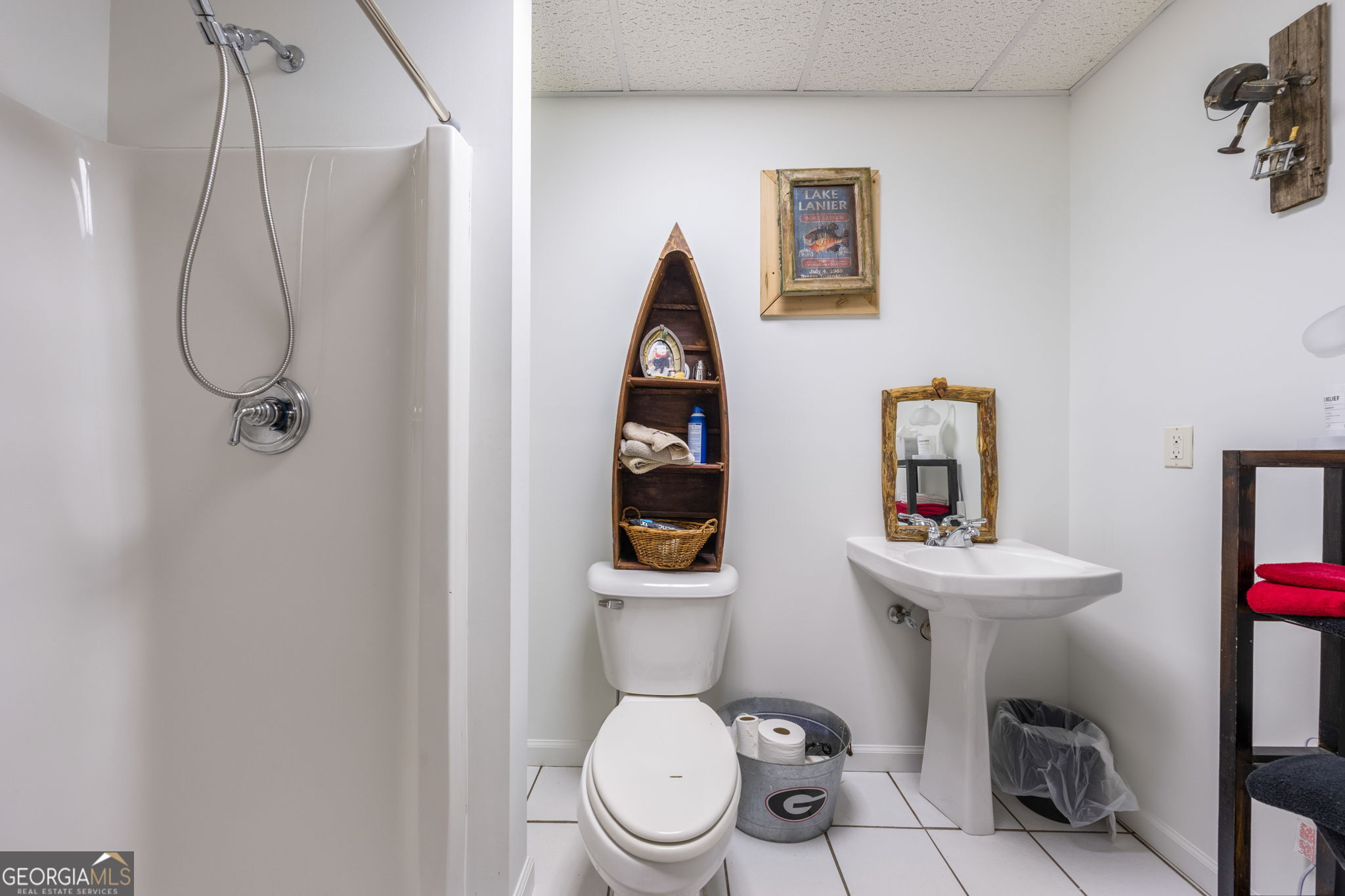 570 Martin Mill Road Moreland, GA 30259 - Photo 47 of 68 a bathroom with a toilet sink and mirror