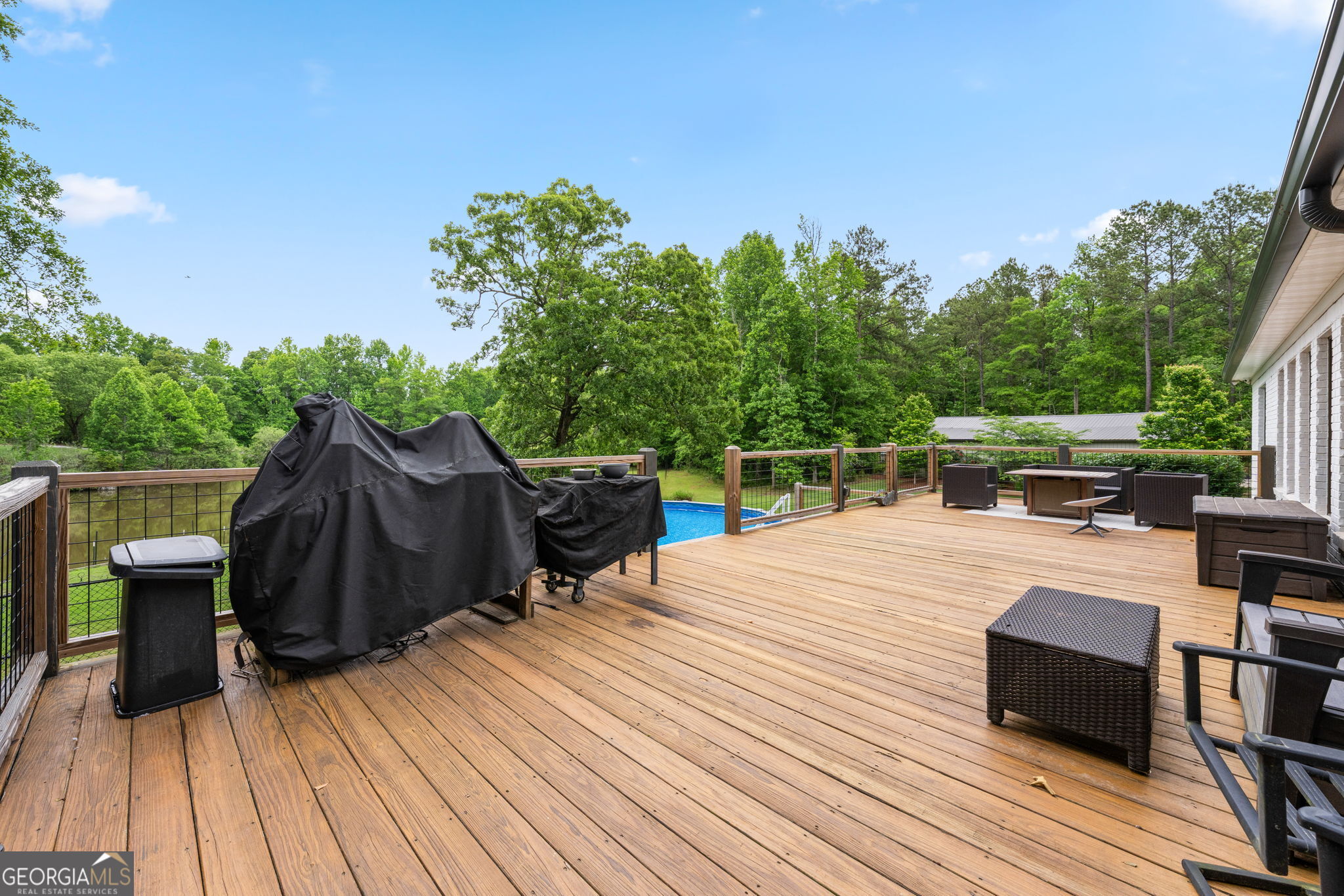 570 Martin Mill Road Moreland, GA 30259 - Photo 50 of 68 a view of a roof deck with wooden floor and fence