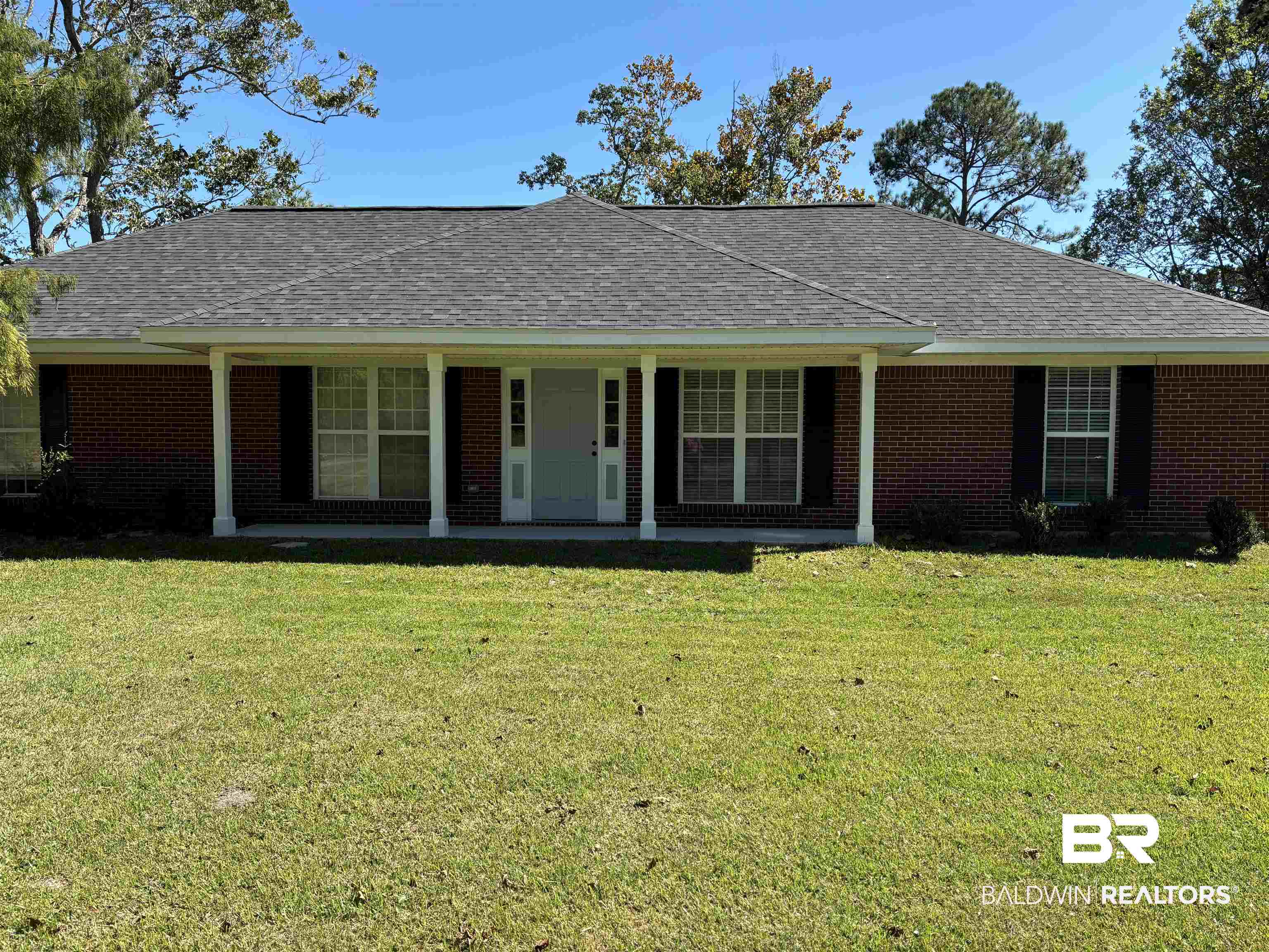 14313 Hemley Road Coden, AL 36523 - Photo 37 of 44 Ranch-style home featuring a front lawn and covered porch