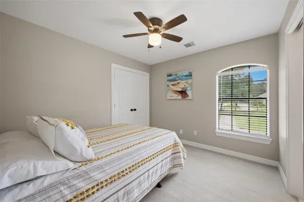 a room with furniture and wooden floor