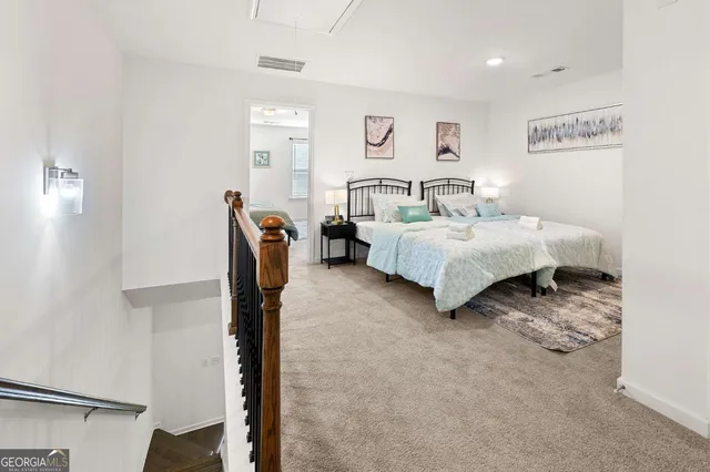 a bed room with furniture and a window