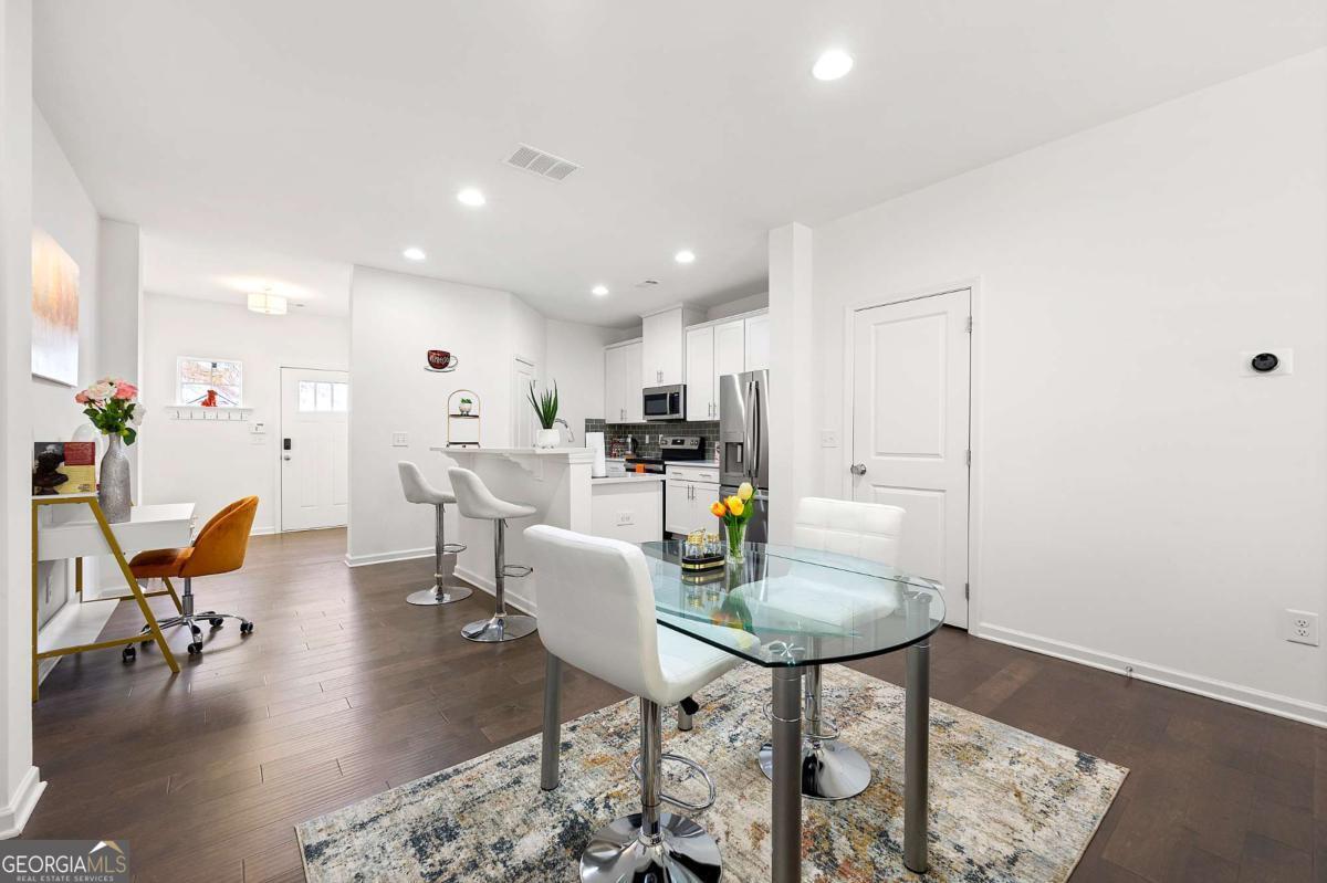 849 Crestwell Circle Atlanta, GA 30331 - Photo 8 of 21 a view of a dining room with furniture