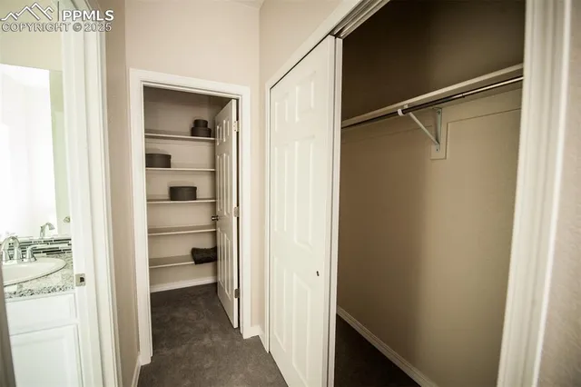 a view of a bathroom from a hallway