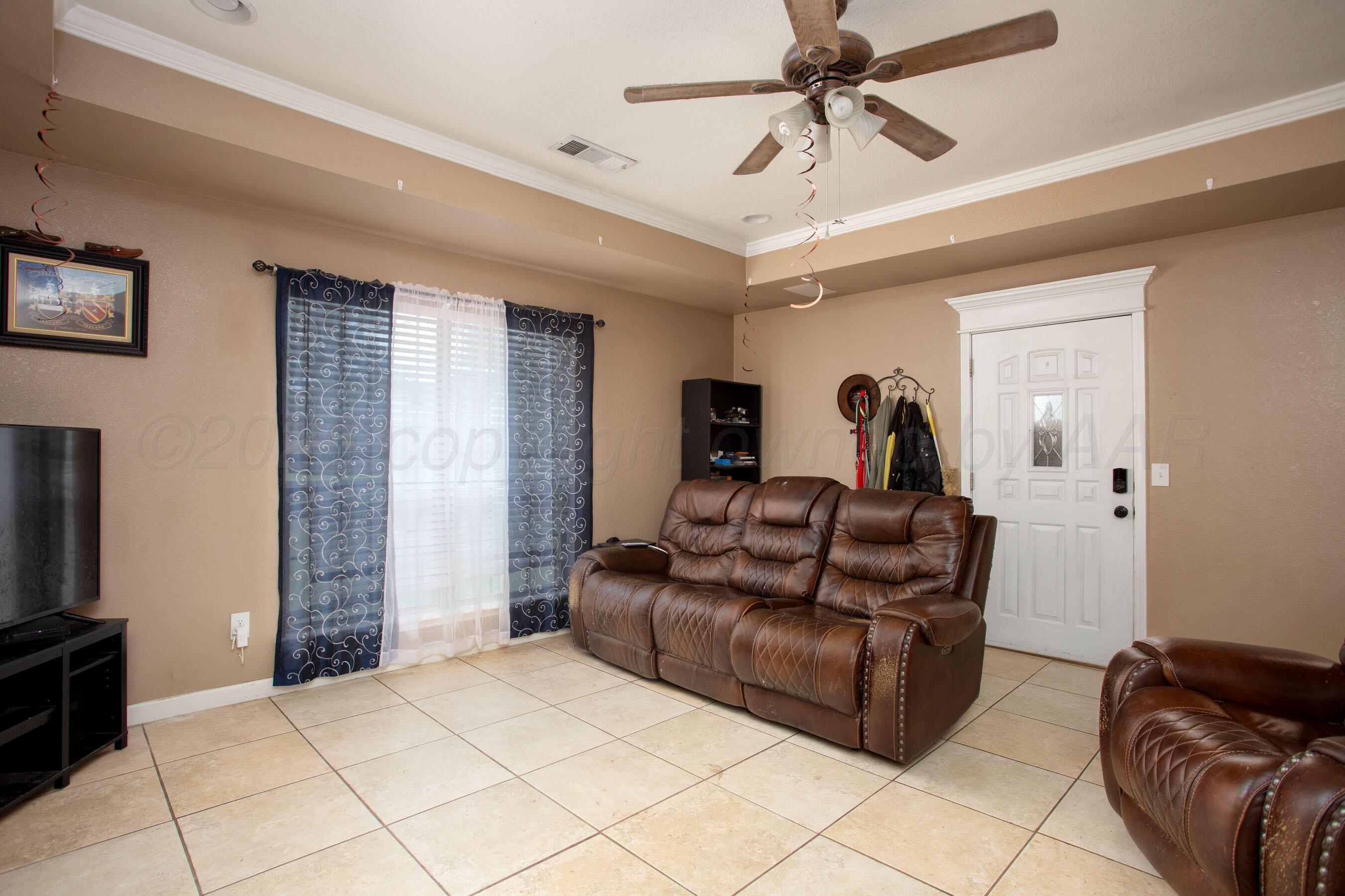 2113 Southwest 59th Avenue Amarillo, TX 79118 - Photo 4 of 24 Living Room A