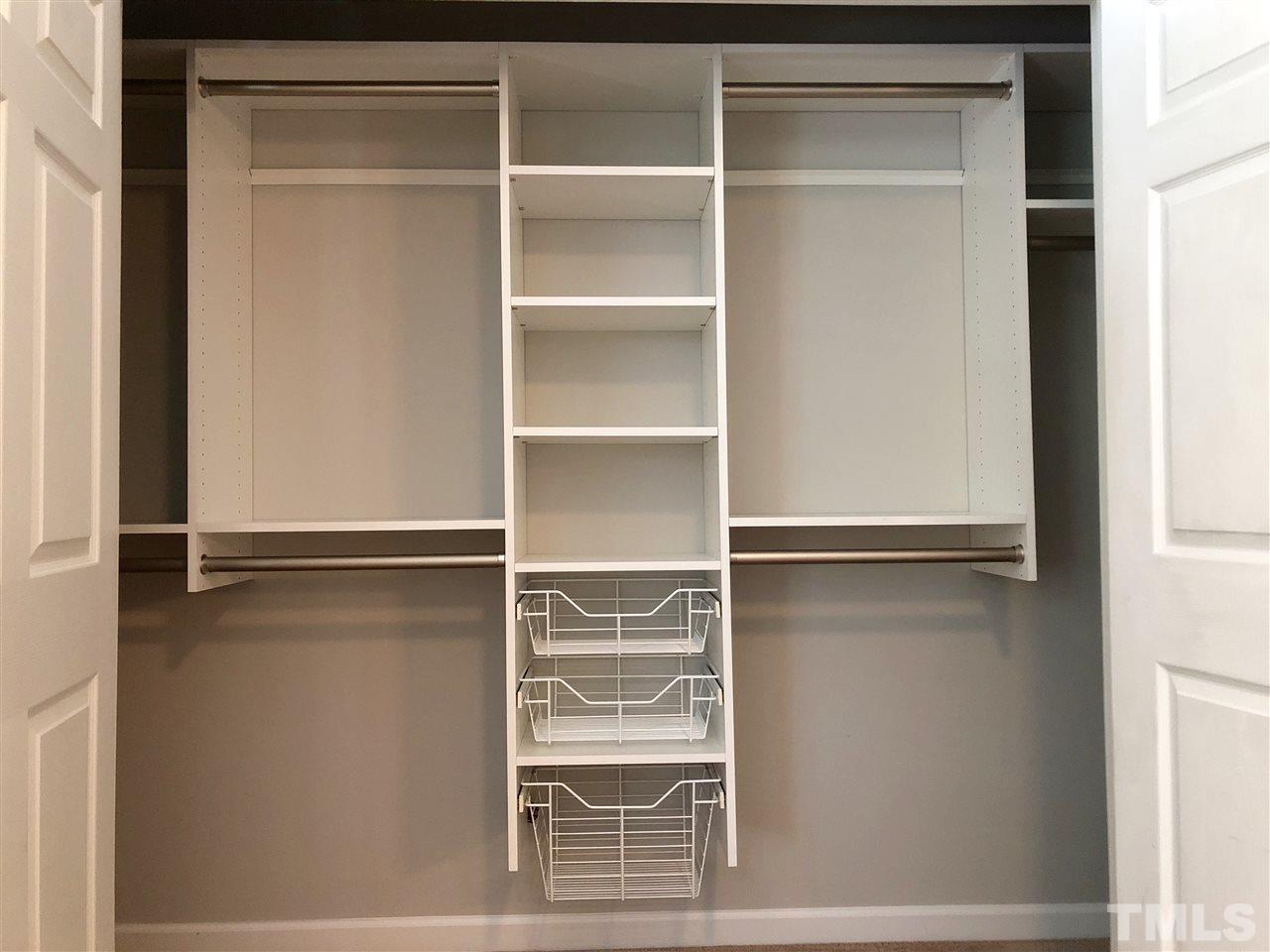 212 West Savannah Ridge Road, Unit 212 Holly Springs, NC 27540 - Photo 14 of 21 a view of an empty walk in closet