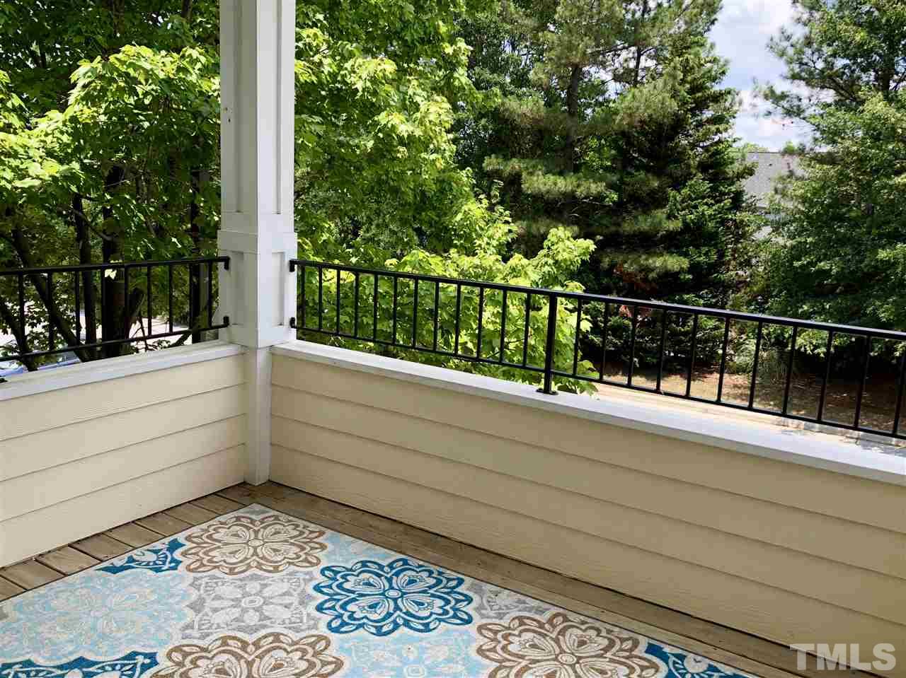 212 West Savannah Ridge Road, Unit 212 Holly Springs, NC 27540 - Photo 16 of 21 a view of a balcony with mountain view