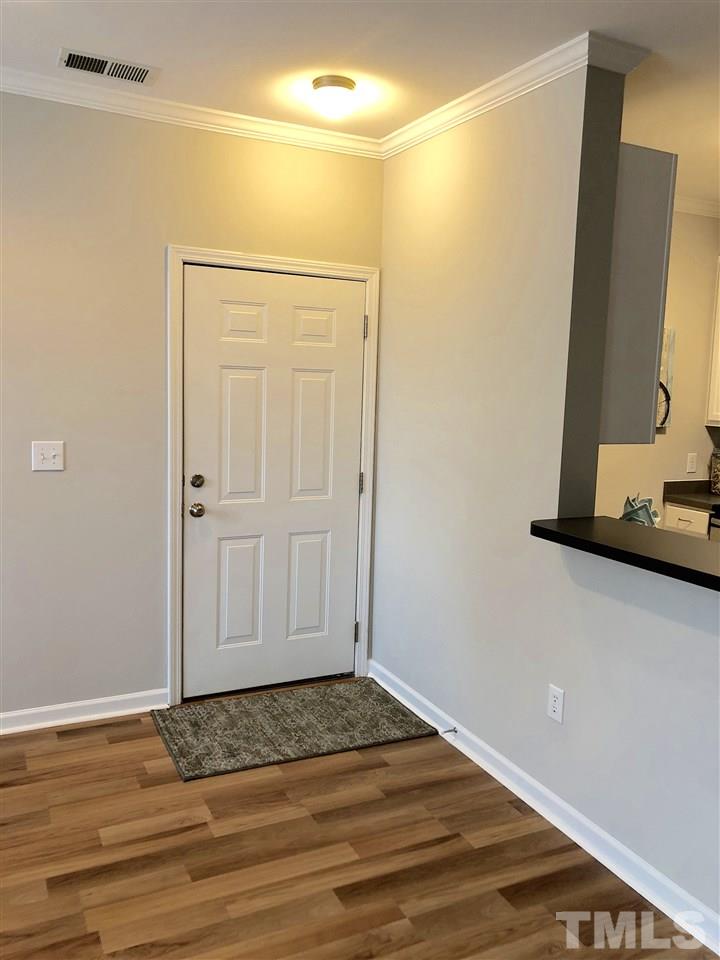 212 West Savannah Ridge Road, Unit 212 Holly Springs, NC 27540 - Photo 3 of 21 a view of an empty room