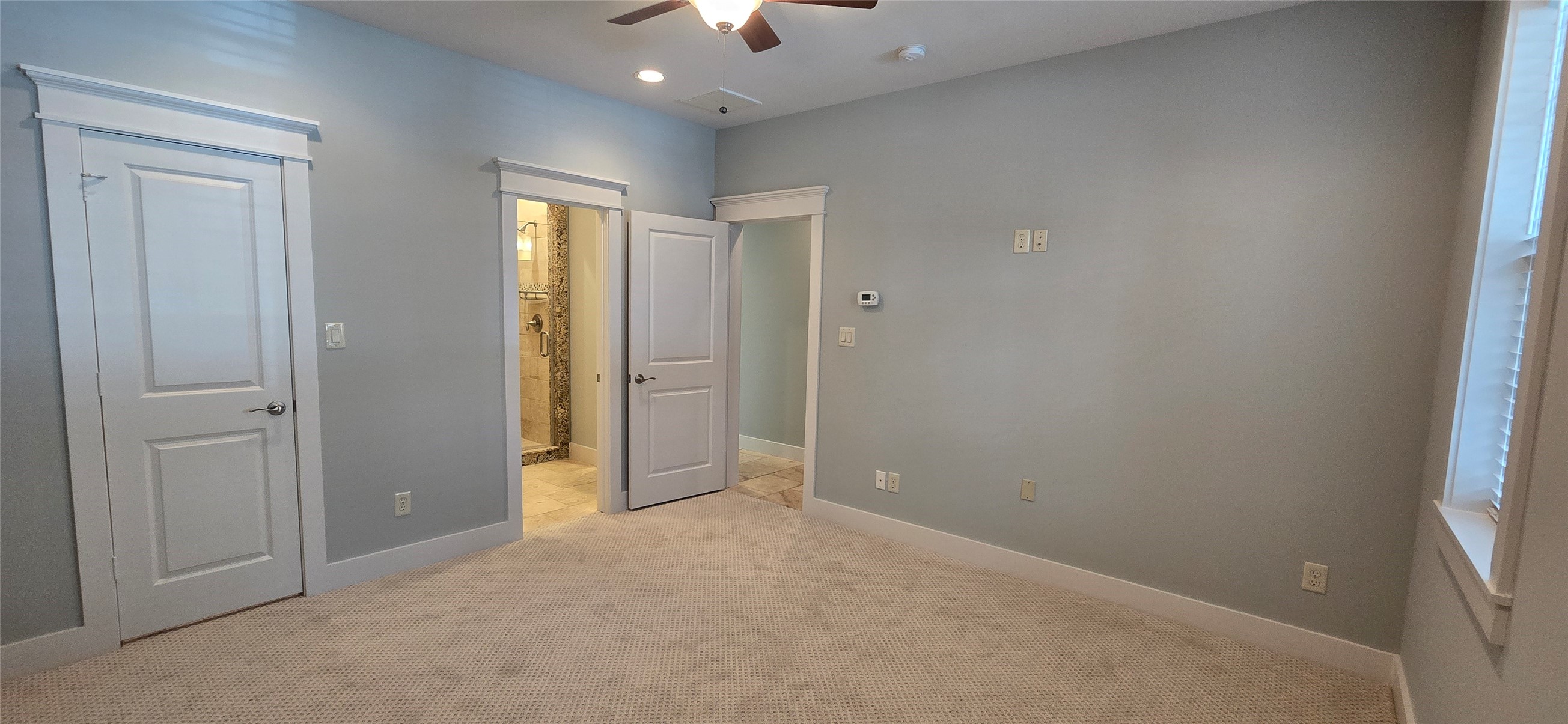 1117 Bonner Street Houston, TX 77007 - Photo 7 of 44 Bedroom 1 features a walk-in closet, ceiling fan with light and an en-suite bathroom with shower only.
