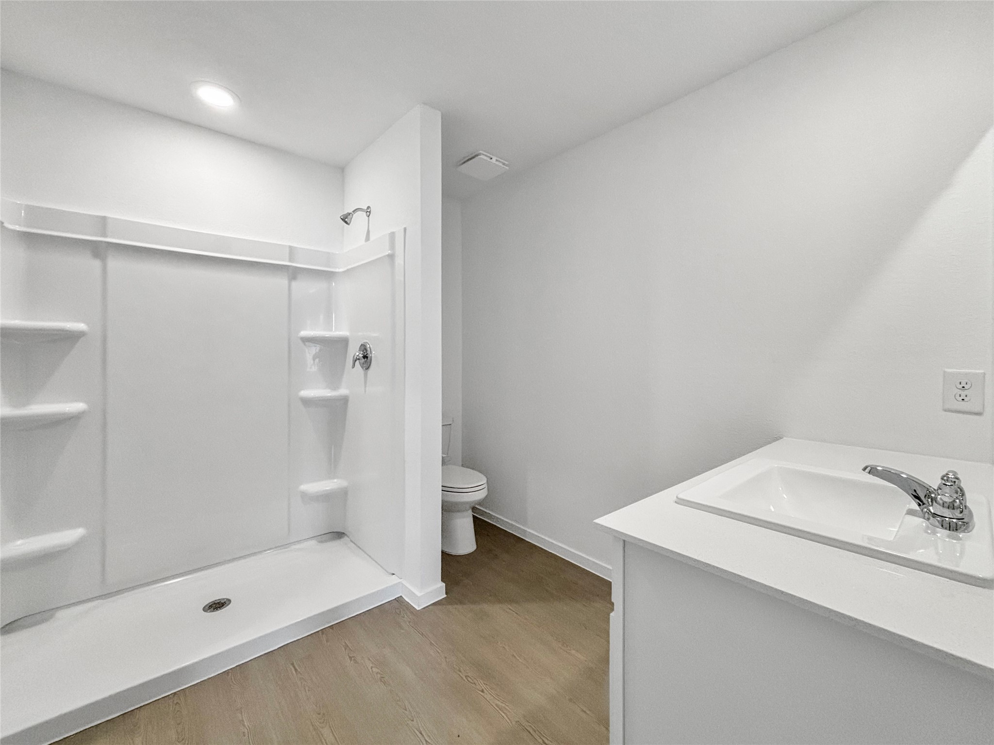 6022 Standpiper Loop Baytown, TX 77521 - Photo 12 of 16 a bathroom with a sink and a shower