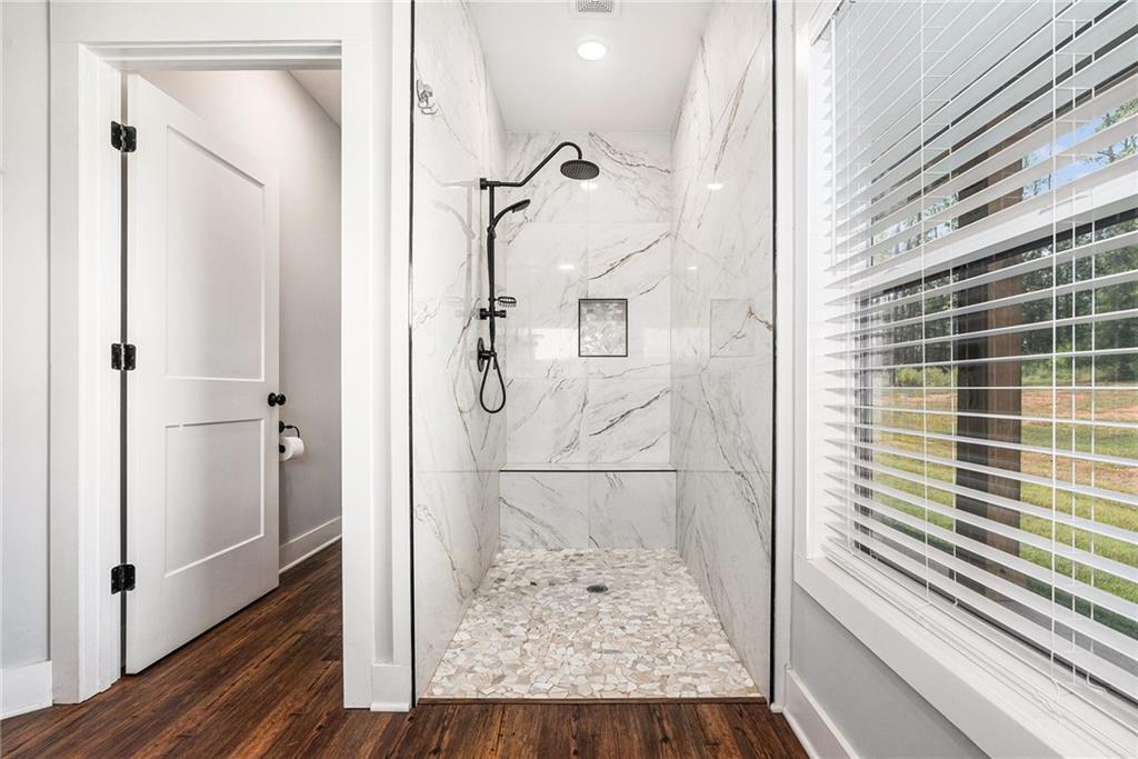 111 Possum Trot Road Barnesville, GA 30204 - Photo 19 of 54 a bathroom with a shower