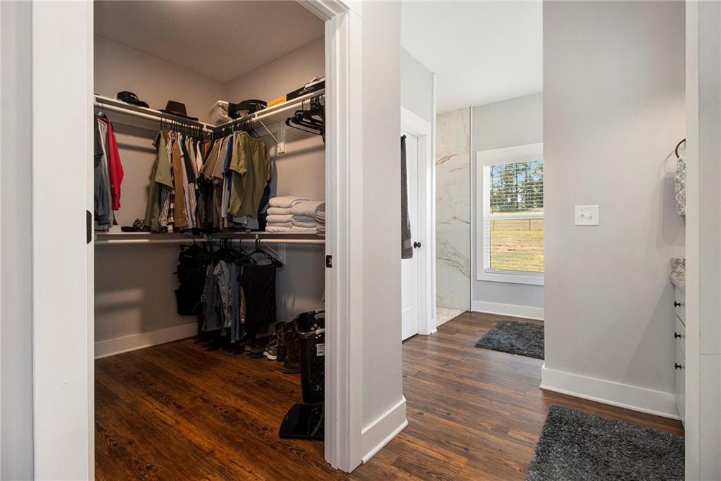 111 Possum Trot Road Barnesville, GA 30204 - Photo 24 of 54 a view of a hallway with wooden floor and closet