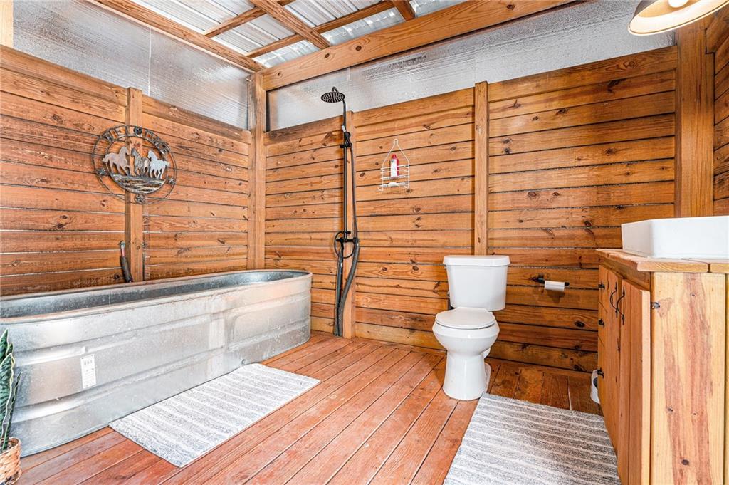 111 Possum Trot Road Barnesville, GA 30204 - Photo 34 of 54 a bathroom with a toilet and a shower