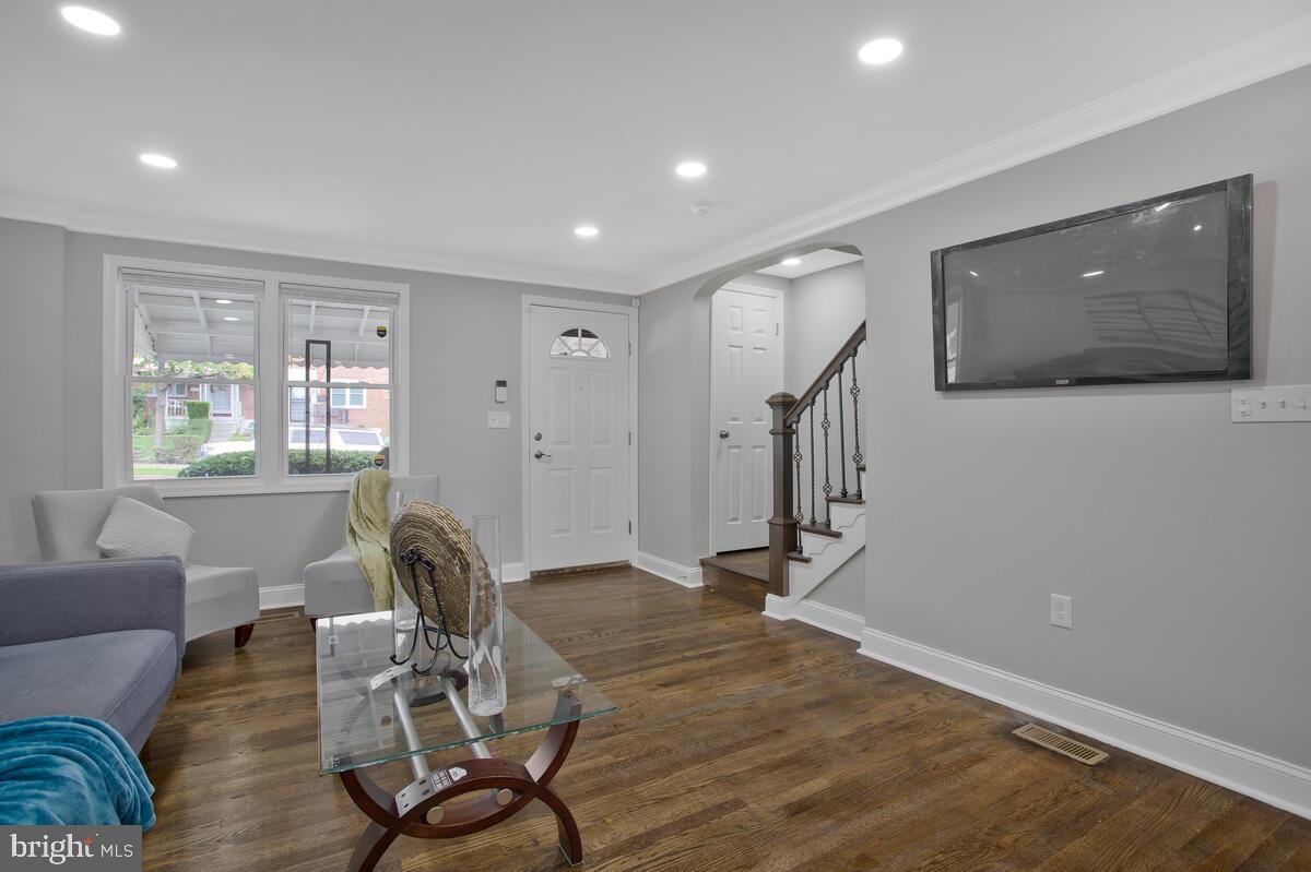 4243 Flowerton Road Baltimore, MD 21229 - Photo 12 of 35 a view of a livingroom with furniture and windows
