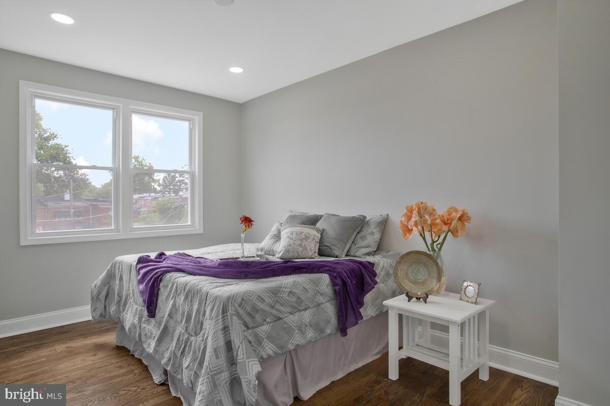 4243 Flowerton Road Baltimore, MD 21229 - Photo 17 of 35 a bedroom with a bed and window