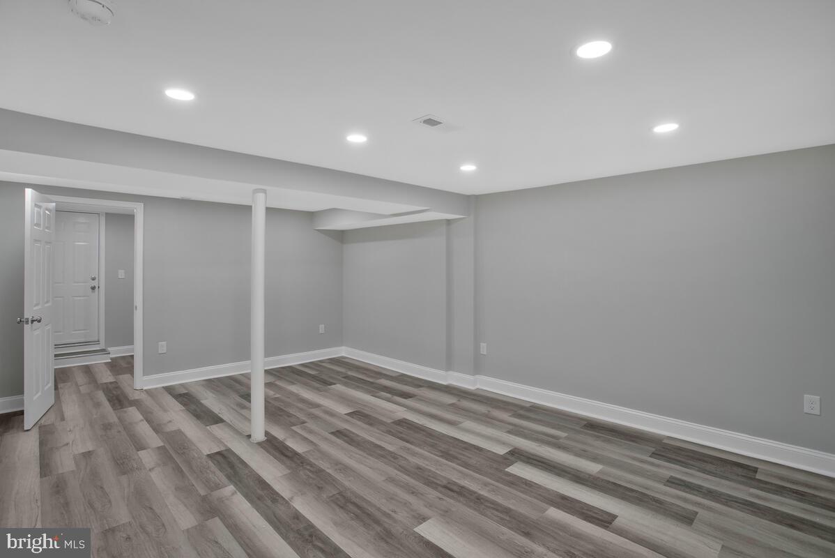 4243 Flowerton Road Baltimore, MD 21229 - Photo 24 of 35 a view of room with wooden floor