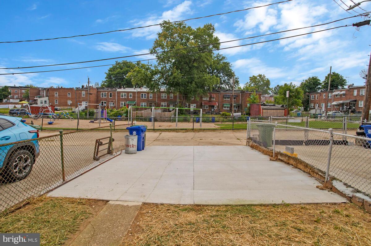 4243 Flowerton Road Baltimore, MD 21229 - Photo 35 of 35 a view of a swimming pool with a slide and a basket