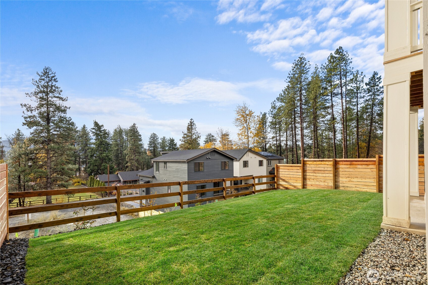 405 Outfitter Place Cle Elum, WA 98922 - Photo 9 of 30 a view of a house with a yard and sitting area