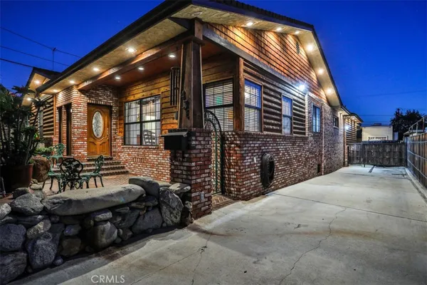 a view of house with outdoor space