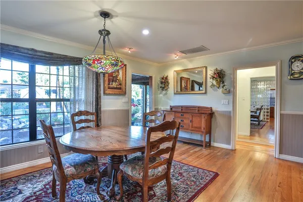 a view of a livingroom with furniture and windows