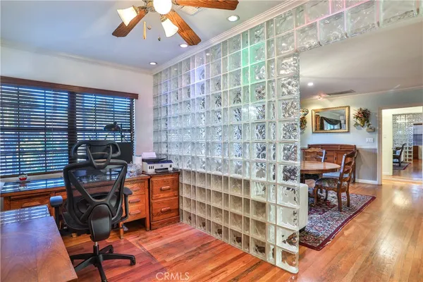 a view of a dining room with furniture water and chandelier