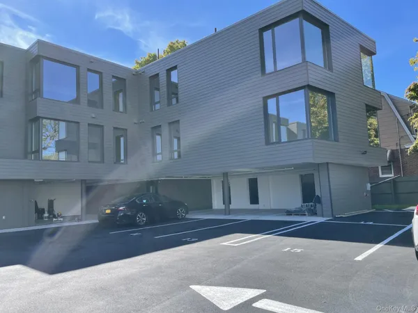 a view of a building with a street