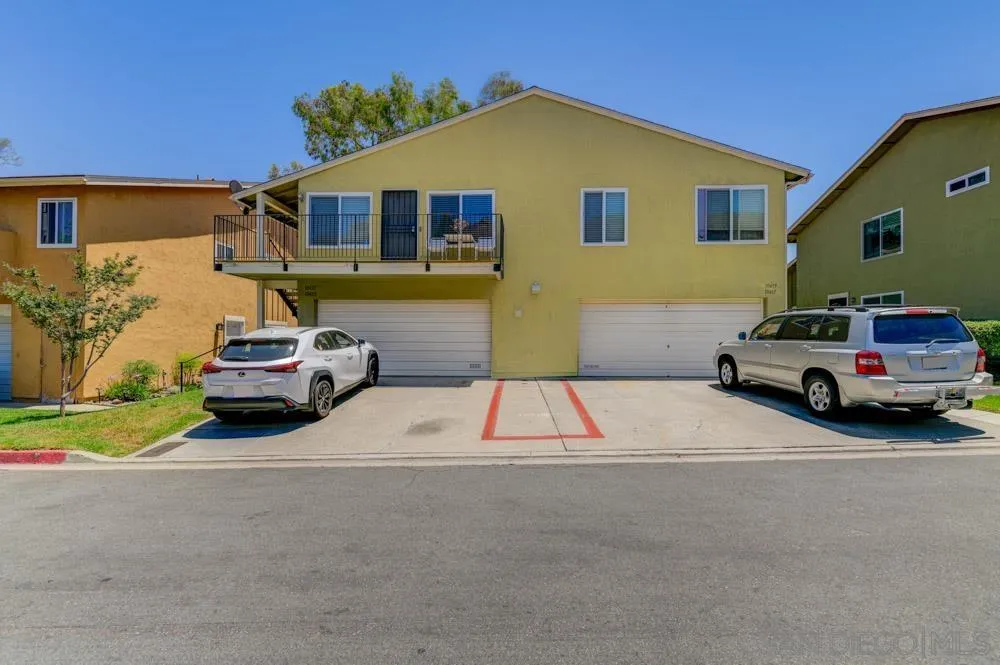 10423 Caminito Rimini San Diego, CA 92129 - Photo 24 of 25 a car parked in front of a house