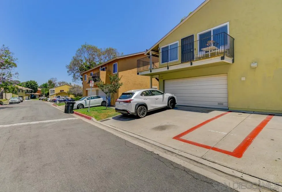 10423 Caminito Rimini San Diego, CA 92129 - Photo 25 of 25 a front view of a house with parking