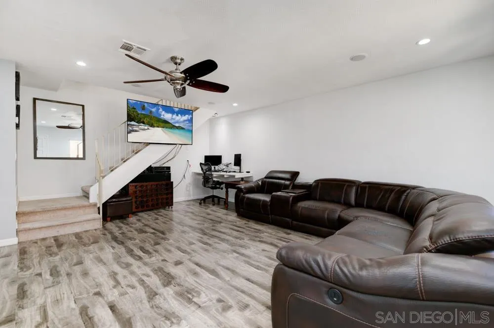 10423 Caminito Rimini San Diego, CA 92129 - Photo 4 of 25 a living room with furniture