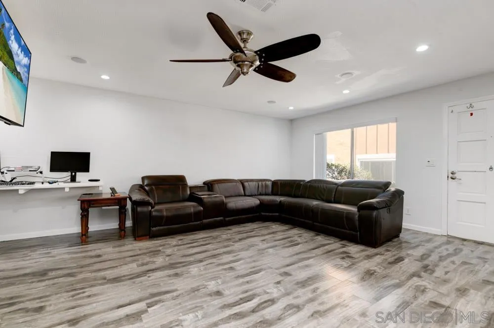 10423 Caminito Rimini San Diego, CA 92129 - Photo 7 of 25 a living room with furniture