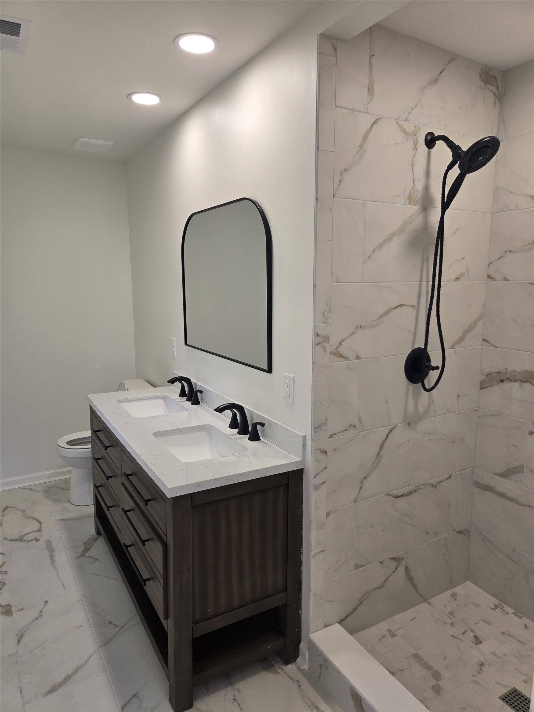 880 Pisgah Road Eads, TN 38028 - Photo 11 of 19 Full bath featuring light marble finish floors, double vanity, a marble finish shower, and recessed lighting