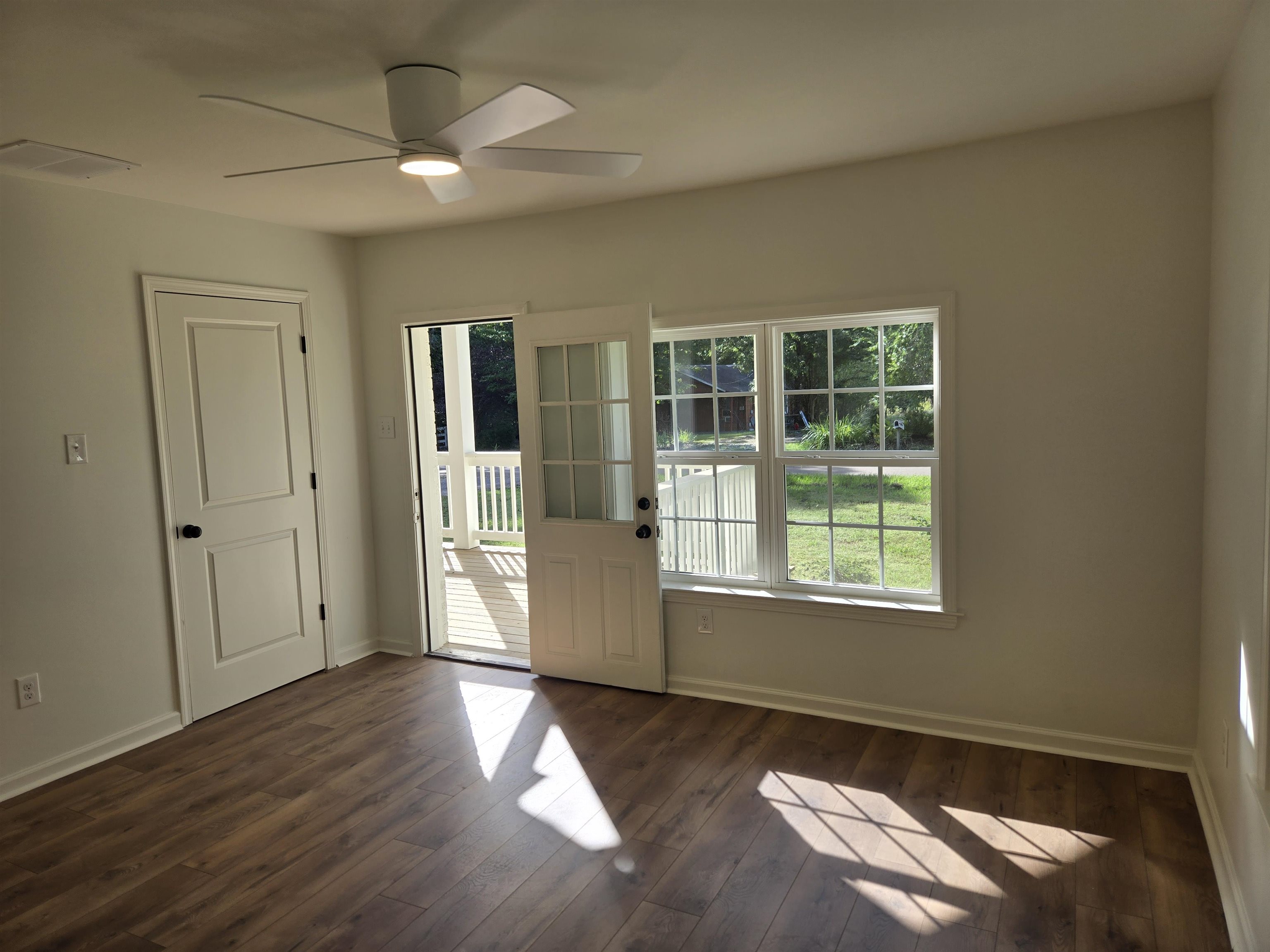 880 Pisgah Road Eads, TN 38028 - Photo 12 of 19 Unfurnished room featuring dark wood-type flooring and a ceiling fan