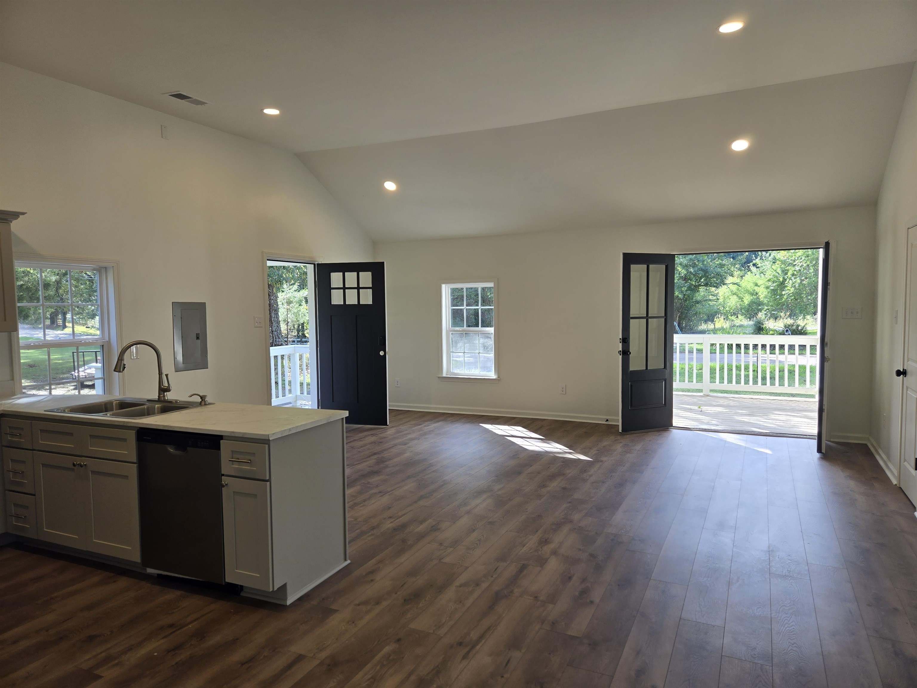 880 Pisgah Road Eads, TN 38028 - Photo 17 of 19 Kitchen with recessed lighting, open floor plan, dark wood finished floors, dishwasher, and vaulted ceiling