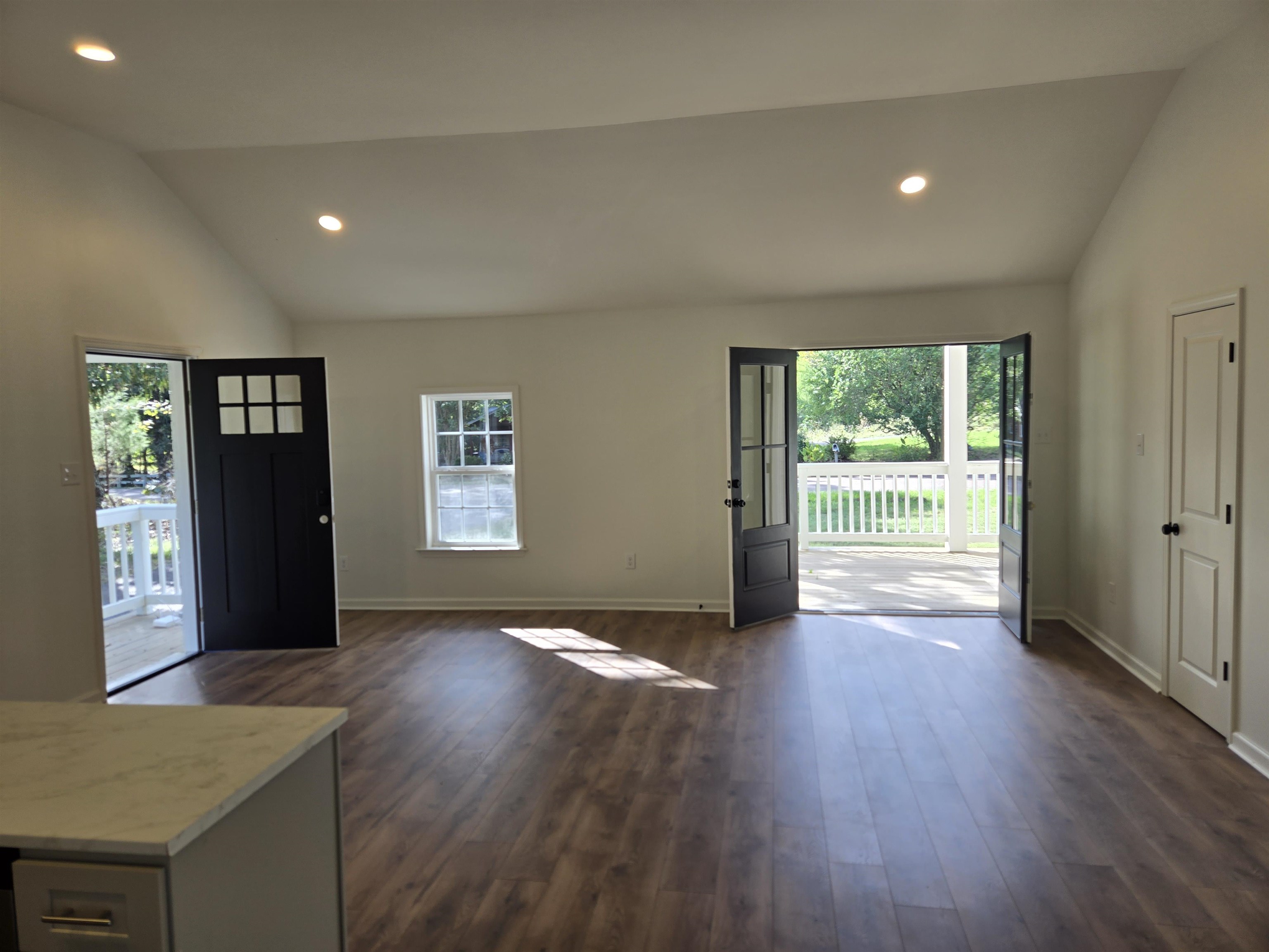 880 Pisgah Road Eads, TN 38028 - Photo 4 of 19 Entrance foyer featuring vaulted ceiling, recessed lighting, plenty of natural light, and dark wood-type flooring