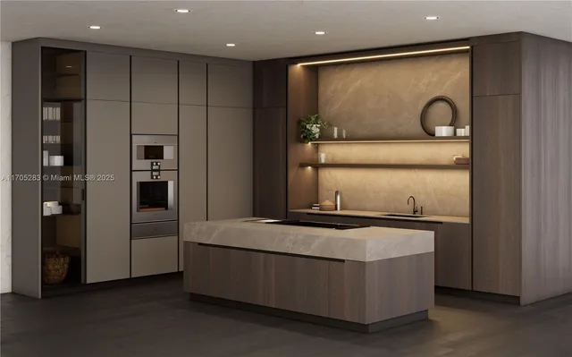 a kitchen with stainless steel appliances granite countertop a refrigerator and a stove